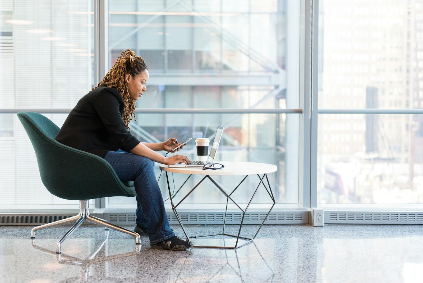 Woman Sitting on Blue and Gray Chair